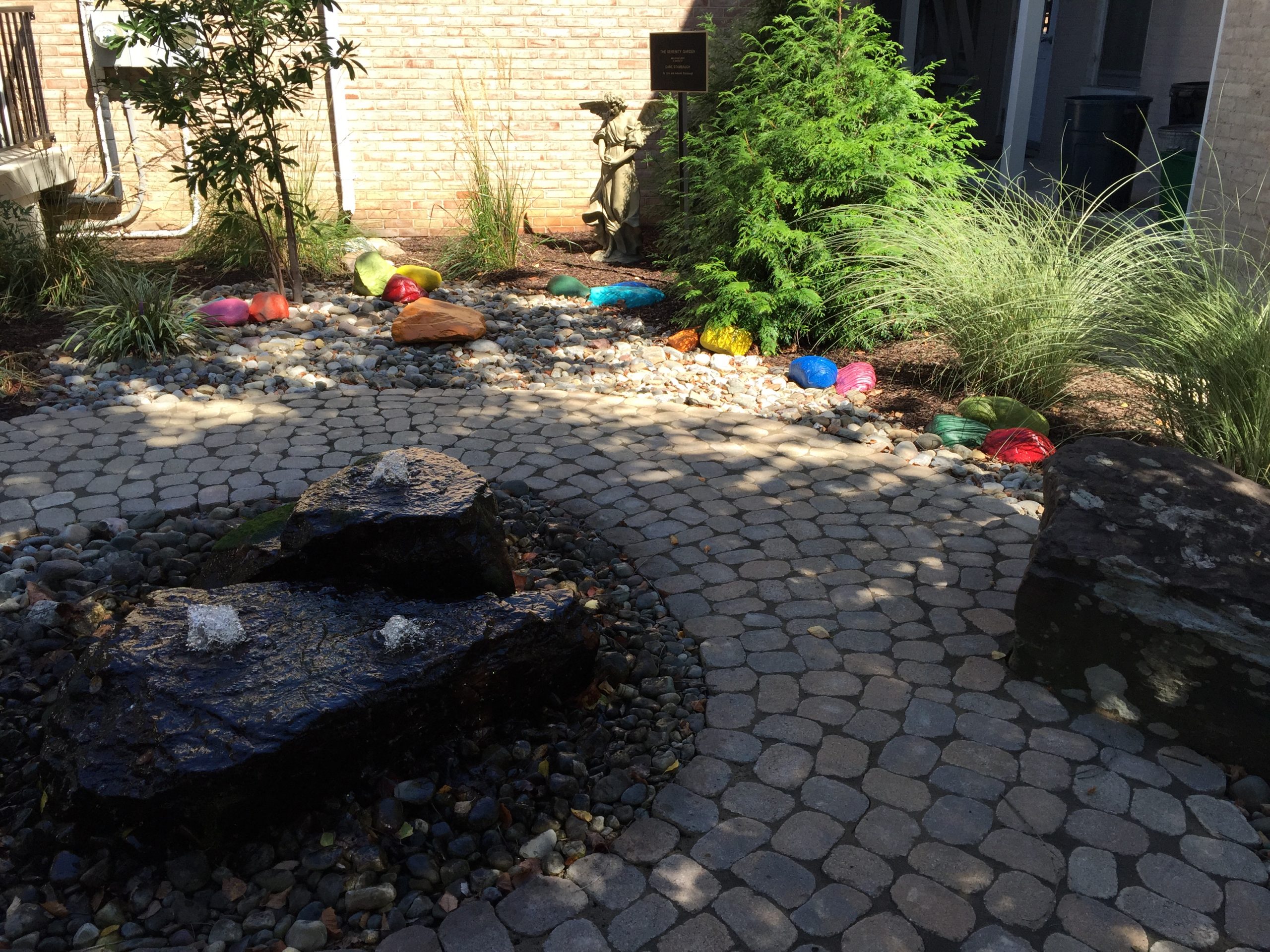 The Serenity Garden Our garden is designed to welcome visitors. It provides an environment conducive for holding rituals. The bubbling fountain and children’s rock garden bring a sense of peace for our families. The garden was lovingly gifted by Lynn and Hannah Stambaugh in memory of husband and father, Dane.