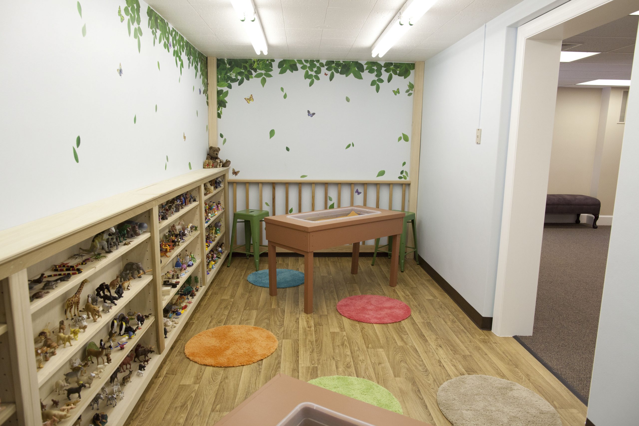 Designed to facilitate the grief work of young children whose vocabulary is limited, this beautiful room holds great energy! Decorated to resemble a “tree fort”, the miniature world, complete with two large sand trays, allows for young children as well as older ones to share their stories. This special one of a kind room, once a vault, was lovingly gifted by the Frank LeCrone Family.
