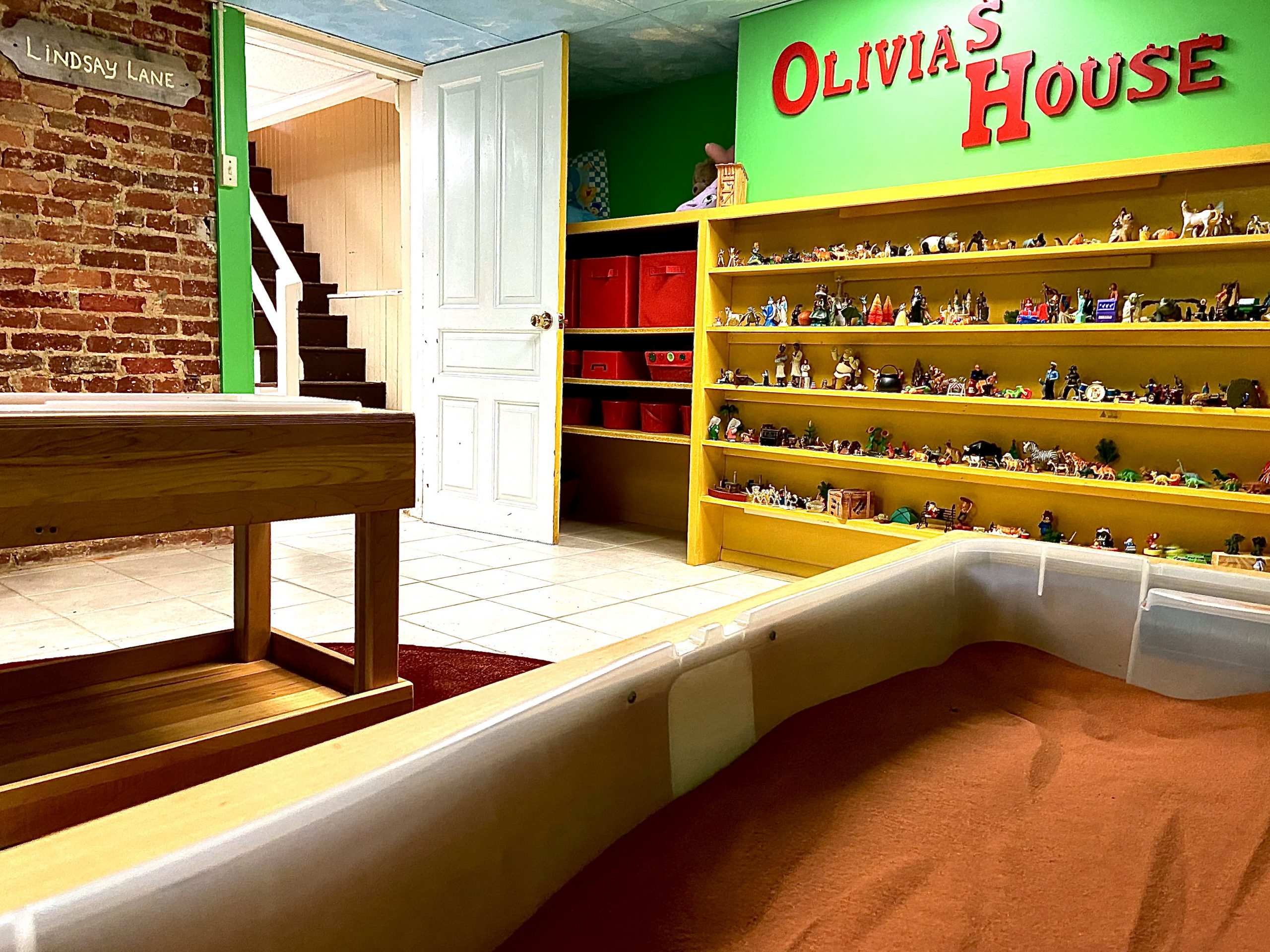 The Sand and Water Room Miniatures come to life in our Sand and Water Room! Designed to facilitate the grief work of young children whose vocabulary is limited, this beautiful room holds great energy! Decorated in memory of Lindsay Gardner, by her family, this room is very special to Olivia's House.